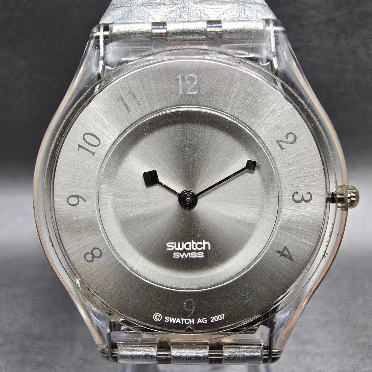 Swatch Skin Facet Glam Watch Women 34mm Silver Dial Clear Case SFK312 New Batt4