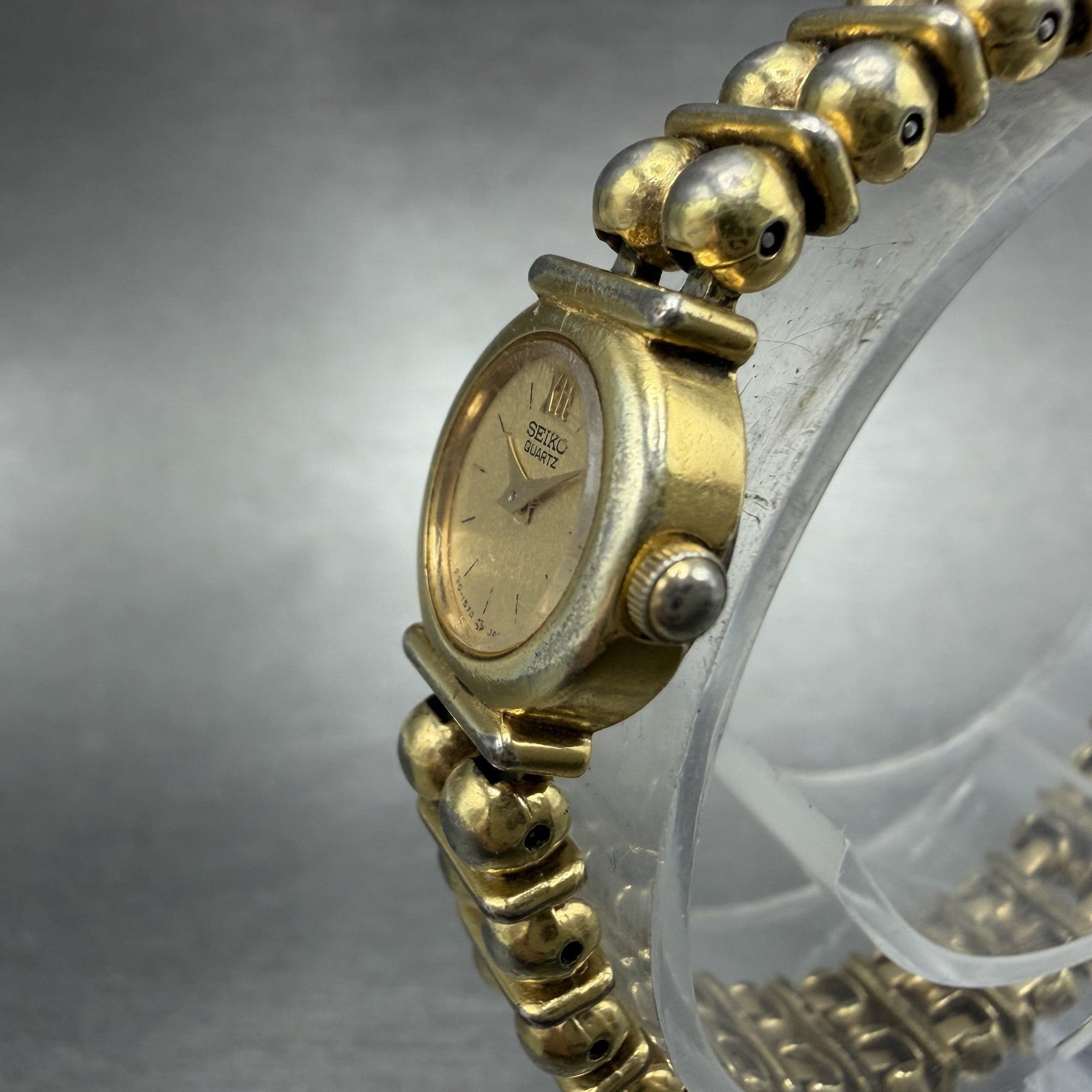 Seiko Watch Women 15mm Champagne Dial Gold Tone Round 1E20-0449 New Battery2