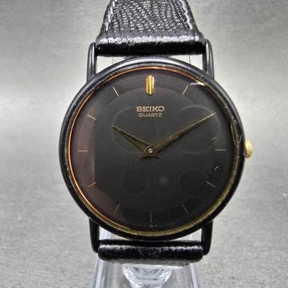 Seiko Watch Men 32mm Black Dial Black & Gold Tone Round 5Y30-7039 PARTS0