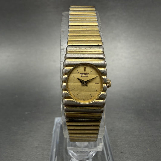 Seiko Watch Women 14mm Champagne Dial Gold Tone Rectangle 1E20-5099 New Battery0