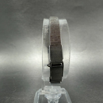 Seiko Watch Women 13mm Silver Dial Silver Tone Rectangle 1320-5779 New Battery77