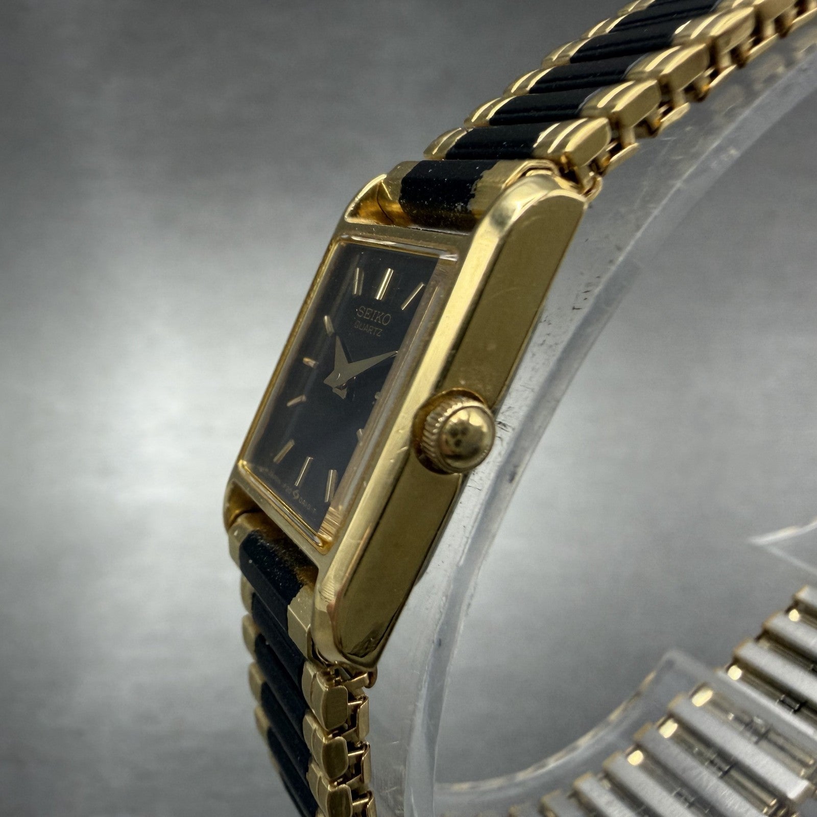 Seiko Tank Watch Women 14mm Black Dial Gold Tone Rectangle 1F20-5A69 New Batt TH2