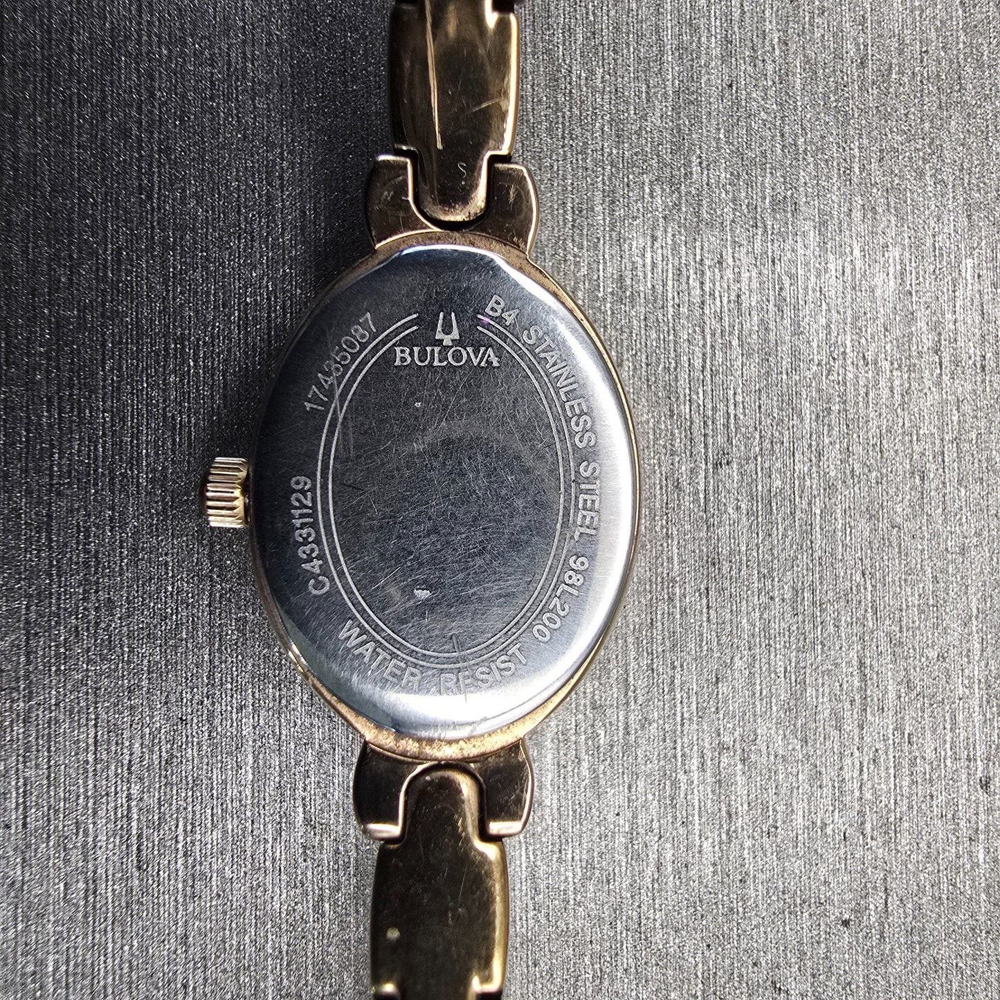 Bulova Watch Women 17mm MOP Dial Rose Gold Tone Gemmed Oval 98L200 New Battery10