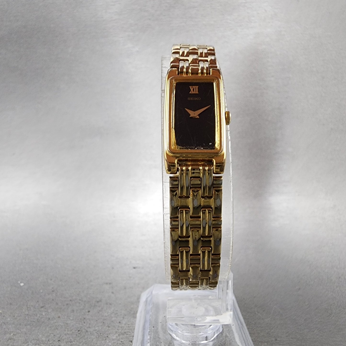 Seiko Tank Watch Women 13mm Black Dial Gold Tone 2e207021 New Battery ABC125