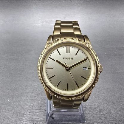 Fossil Watch Women 34mm Champagne Dial Gold Tone Date Round BQ3375 New Battery0