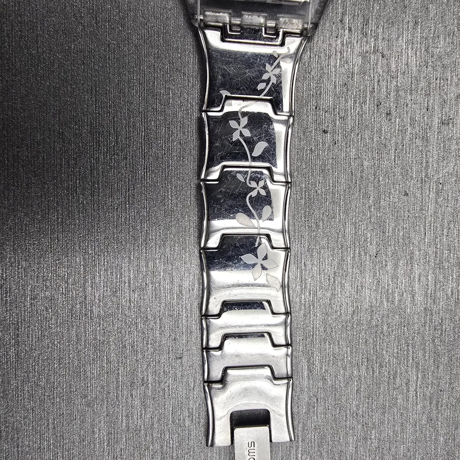 Swatch Skin CLIMBER FLOWERY Watch Women Silver Dial Clear Case SFK300G New Batt12
