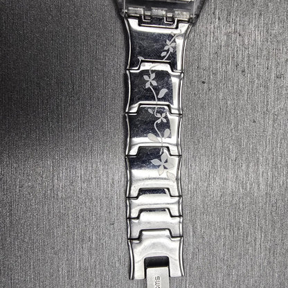 Swatch Skin CLIMBER FLOWERY Watch Women Silver Dial Clear Case SFK300G New Batt12