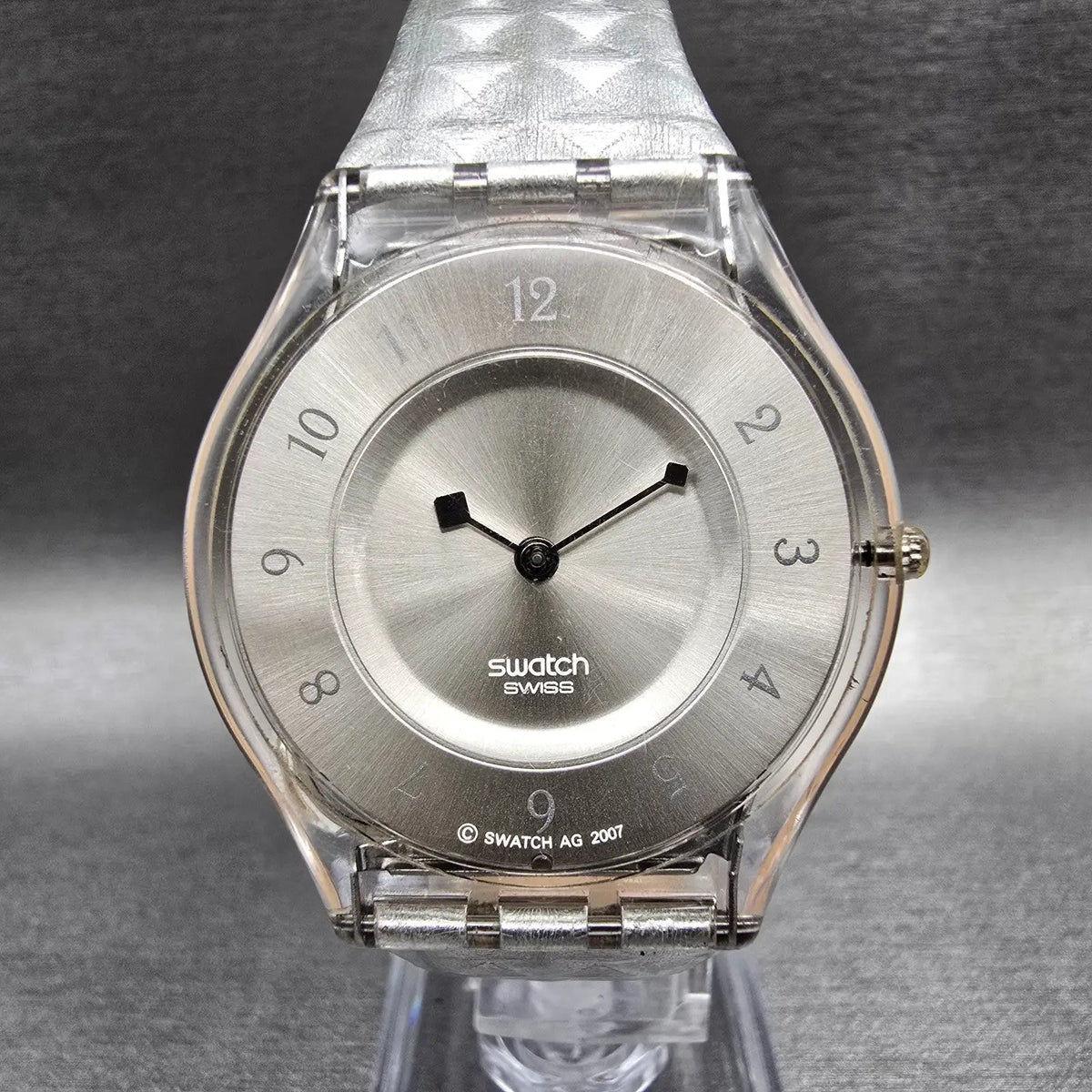 Swatch Skin Facet Glam Watch Women 34mm Silver Dial Clear Case SFK312 New Batt0