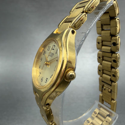 Citizen Watch Women 23mm Champagne Dial Gold Tone Round Date 1012-S072689 NewBat2