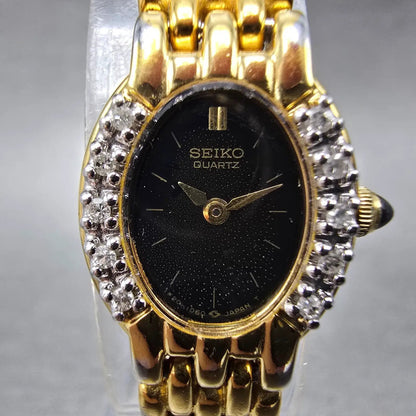 Seiko Watch Women 16mm Black Dial Gold Tone Gemmed Oval 1F20-5G19 New Battery1
