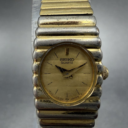 Seiko Watch Women 14mm Champagne Dial Gold Tone Rectangle 1E20-5099 New Battery1