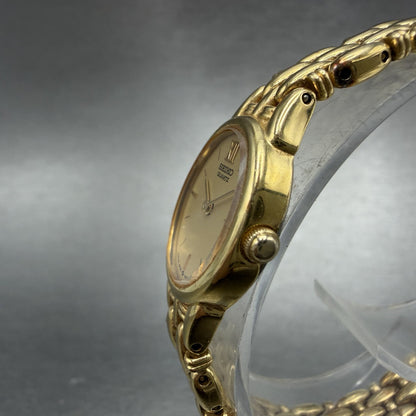 Seiko Watch Women 17mm Champagne Dial Gold Tone Oval 2P20-5B09 New Battery2