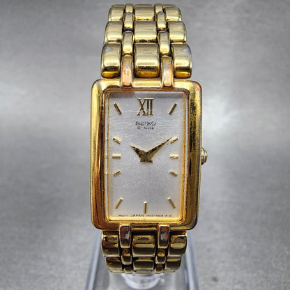 Seiko Tank Watch Women 17mm White Dial Gold Tone Rectangle 1N006B79 New Batt0
