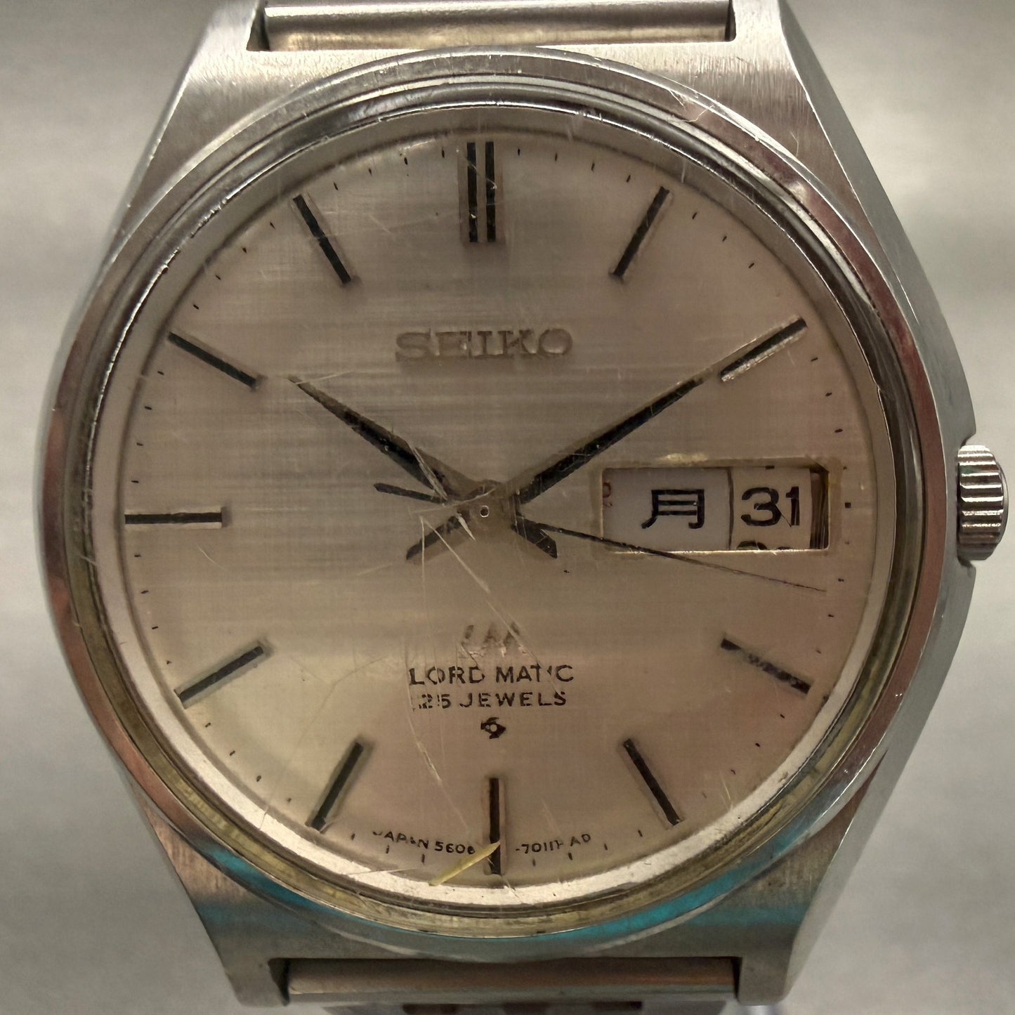 Seiko Lord Matic Watch Men 37mm Silver Dial Silver Tone Daydate Round 5606-70101