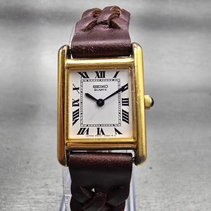 Seiko Tank Watch Women 18mm White Dial Gold Tone Rectangle 4N00-5809 New Battery0