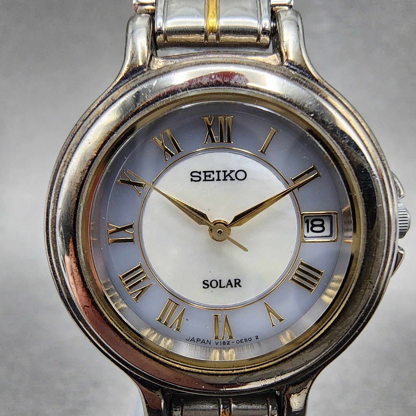 Seiko Solar Watch Women 28mm MOP Dial Two Tone Date Round V1820C70 Runs1