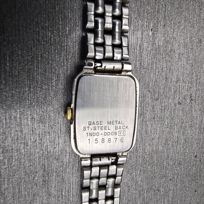 Seiko Watch Women 15mm White Dial Silver Tone Rectangle 1N00-0D09 New Battery10