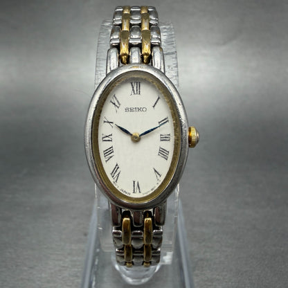 Seiko Watch Women 17mm White Dial Two Tone Oval Vintage V400-1029 New Battery GH0