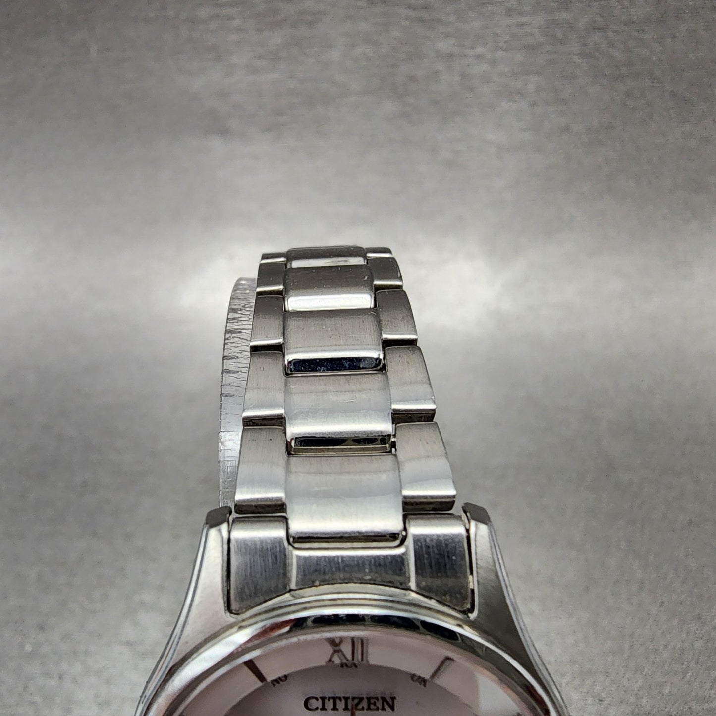 Citizen EcoDrive Watch Women 28mm White Dial Silver Tone Date Round Runs4
