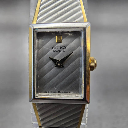 Seiko Watch Women 13mm Silver Dial Two Tone Rectangle 1E20-5109 New Battery VTG1