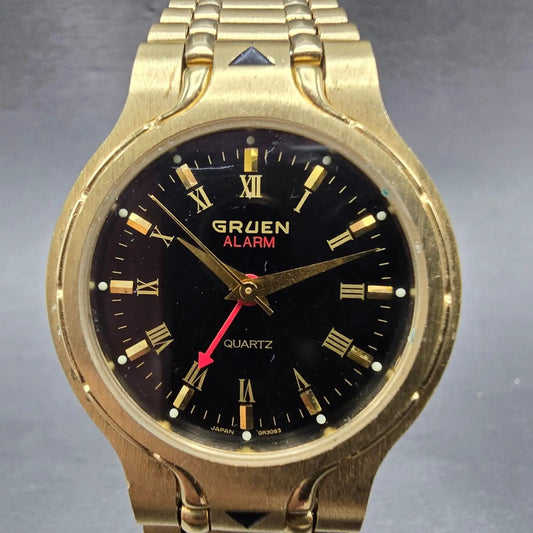Gruen Alarm Watch Men 33mm Black Dial Gold Tone Round 321-6L71 New Battery0