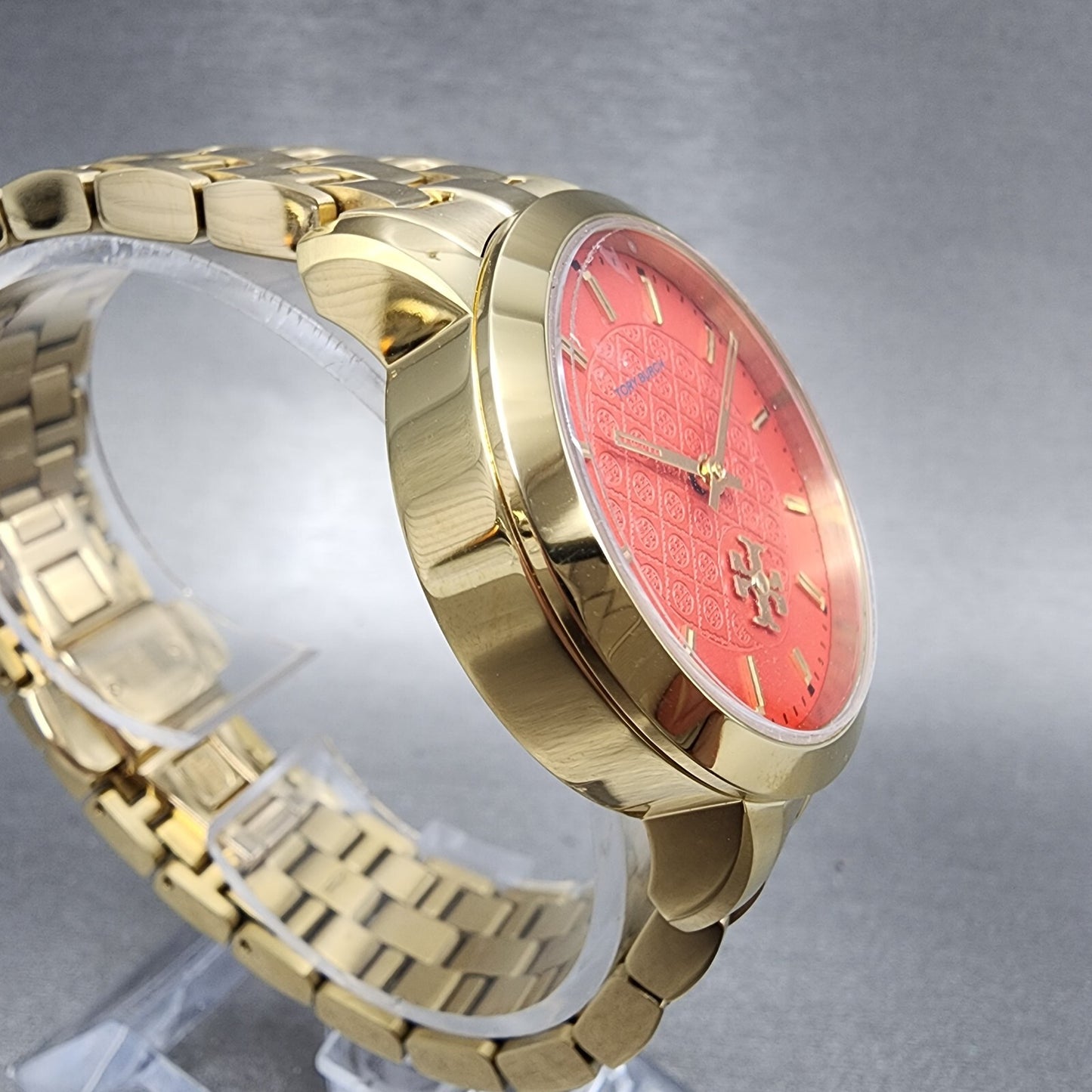 Tory Burch The Tory Watch Women 34mm Red Dial Gold Tone Round TBW10564