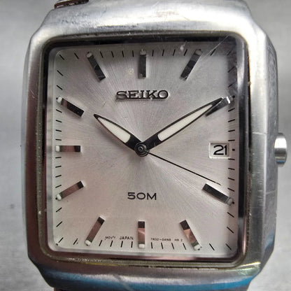 Seiko Watch Men 32mm Silver Dial Silver Tone Date Rectangle 7N32-0AL0 New Batt D1