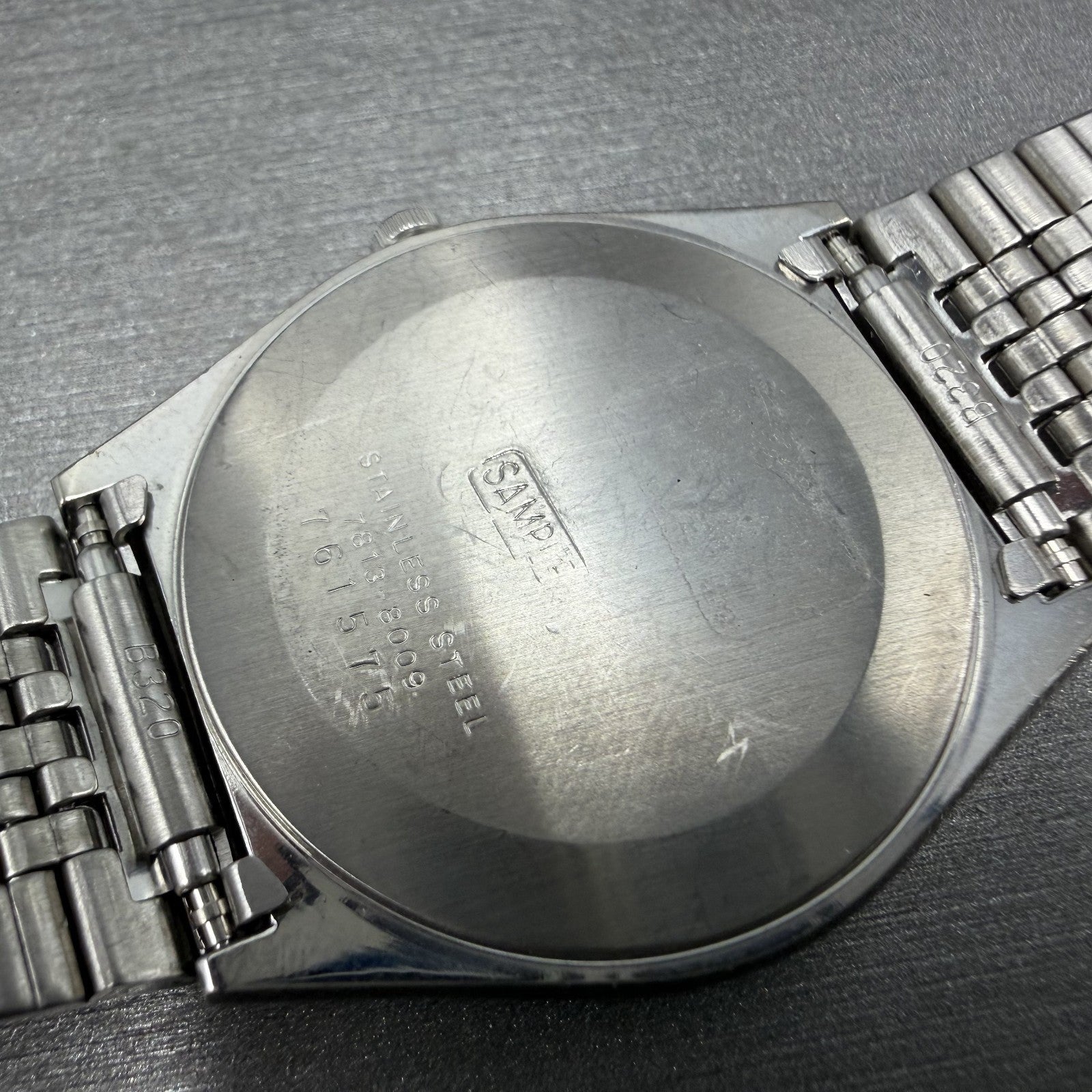 Seiko Watch Men 33mm Silver Dial Silver Tone Daydate Round 7813-8009 SAMPLE10