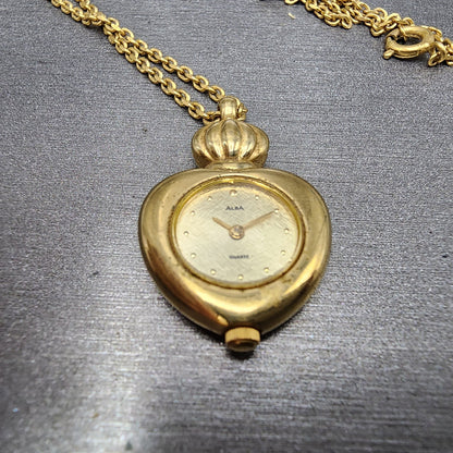 Alba Heart Necklace Watch Women 20mm Champagne Dial Gold Tone Y150-0B20 New Batt