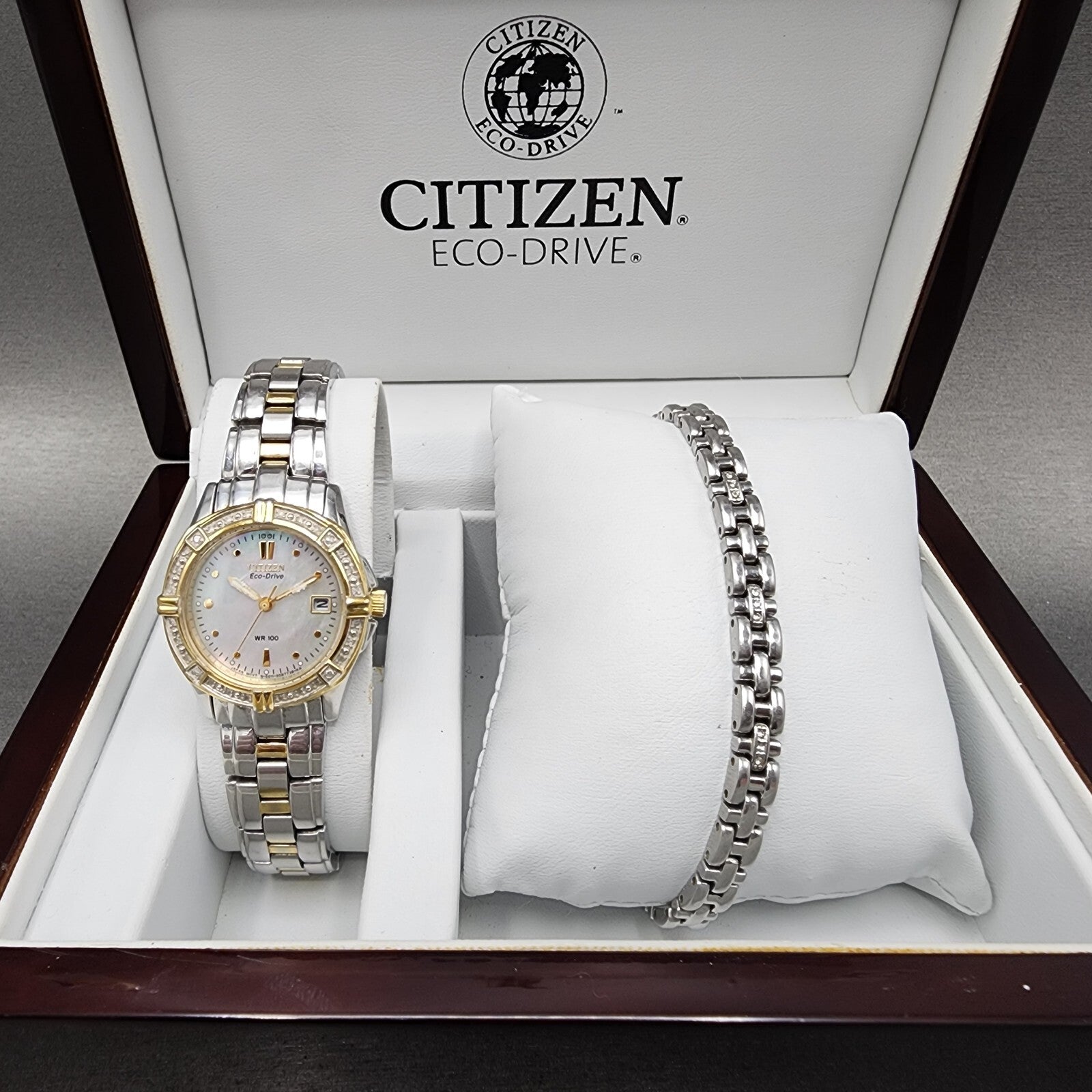 Citizen EcoDrive Watch Women MOP Dial Two Tone Date Round Date Round Runs0