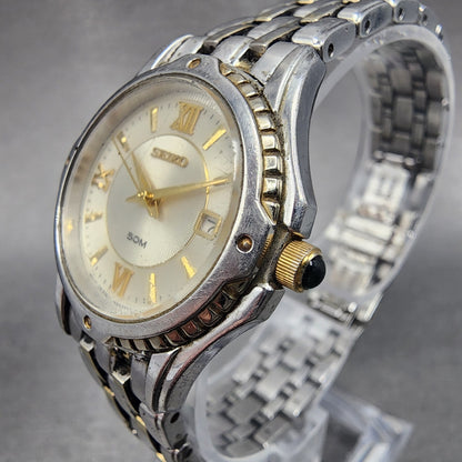 Seiko Watch Women 28mm White Dial Two Tone Date Round 7N82-0GE0 New Battery