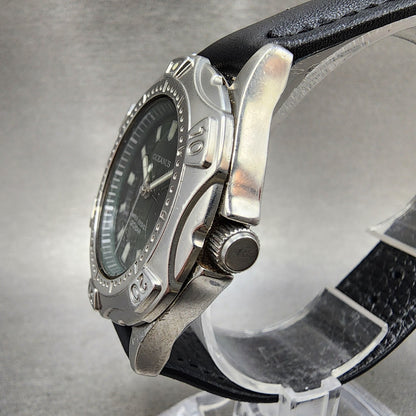 Casio Oceanus stainless steel watch with black dial and leather strap side view