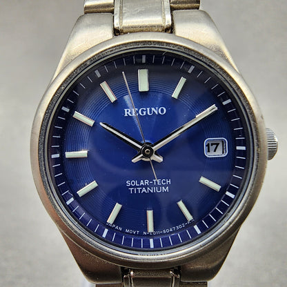Reguno Solar Watch Women 25mm Blue Dial Titanium Date E011S028132 Runs1