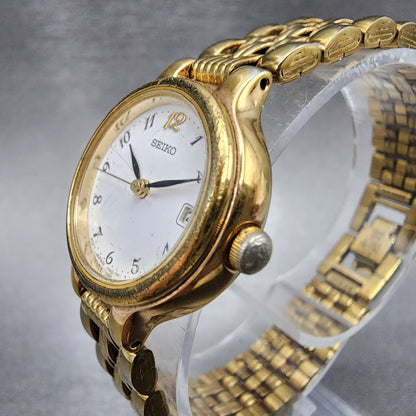 Seiko Watch Women 23mm White Dial Gold Tone Date Round 7N820228 New Battery B122