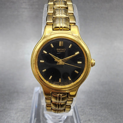 Seiko Watch Women 21mm Black Dial Gold Tone Round V4011111 New Battery0