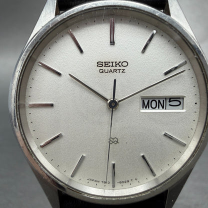 Seiko SQ Watch Men 34mm Silver Dial Silver Tone Daydate READ!! 7813-8029 NewBatt1