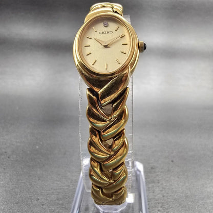 Seiko Watch Women 18mm Champagne Dial Gold Tone Oval 1N00-0BL0 New Battery VTG5
