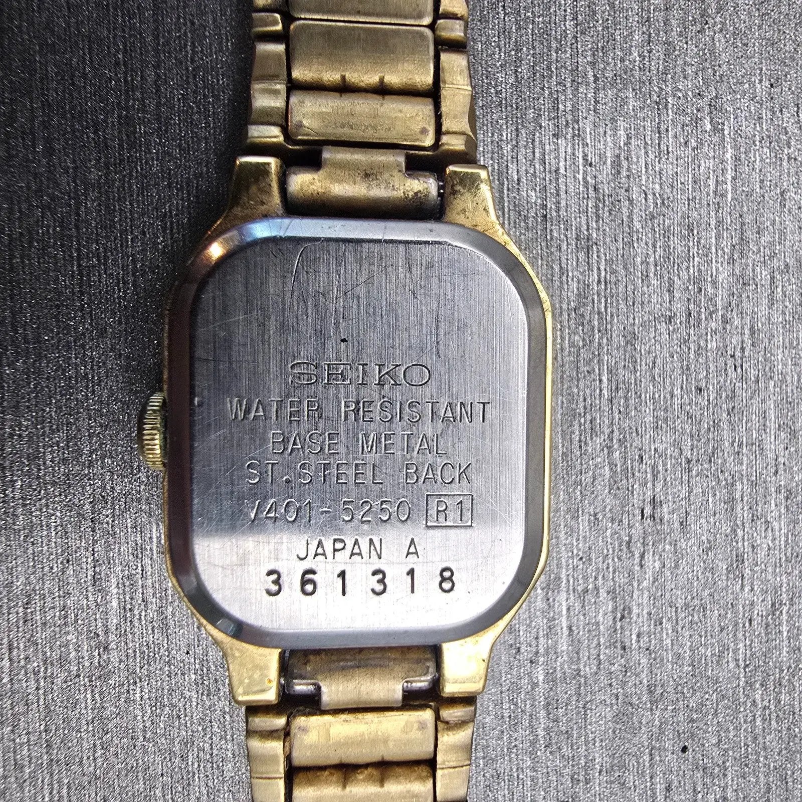 Seiko Watch Women 17mm Black Dial Gold Tone Rectangle V401-5250 New Battery VTG10