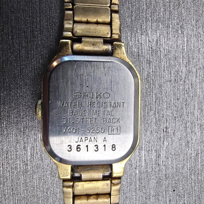 Seiko Watch Women 17mm Black Dial Gold Tone Rectangle V401-5250 New Battery VTG10