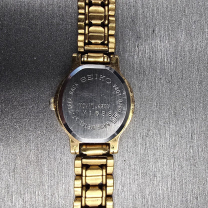 Seiko Watch Women 19mm Black Dial Gold Round V401-0289 New Battery Vintage JP5610
