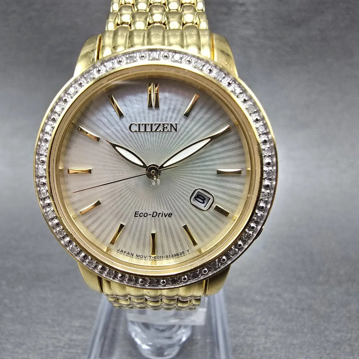 Citizen Eco-Drive Watch Women 30mm MOP Dial Gold Date Diamonds EW2282-52D Runs0