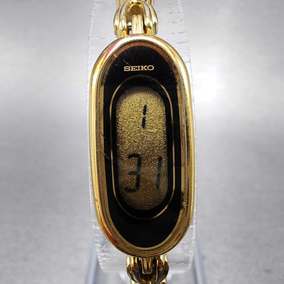 Seiko Watch Women 13mm Digital Gold Tone Oval L6204000 New Battery1