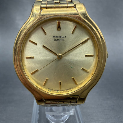 Seiko Watch Men 34mm Champagne Dial Gold Tone Round Vintage V701-6K69 PARTS0