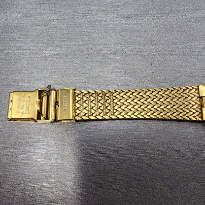 Seiko Tank Watch Women 15mm Gold Dial Gold Tone Rectangle 1F20-5A89 New Batt