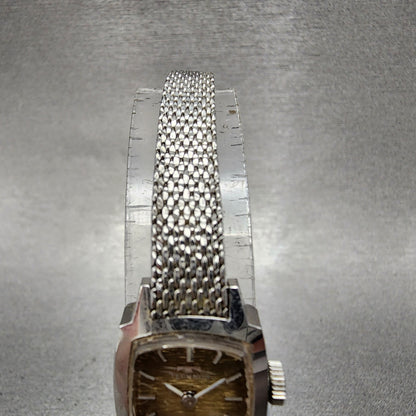 Technos Tank Watch Women 16mm Gold Dial Silver Tone Rectangle Manual Wind Runs4