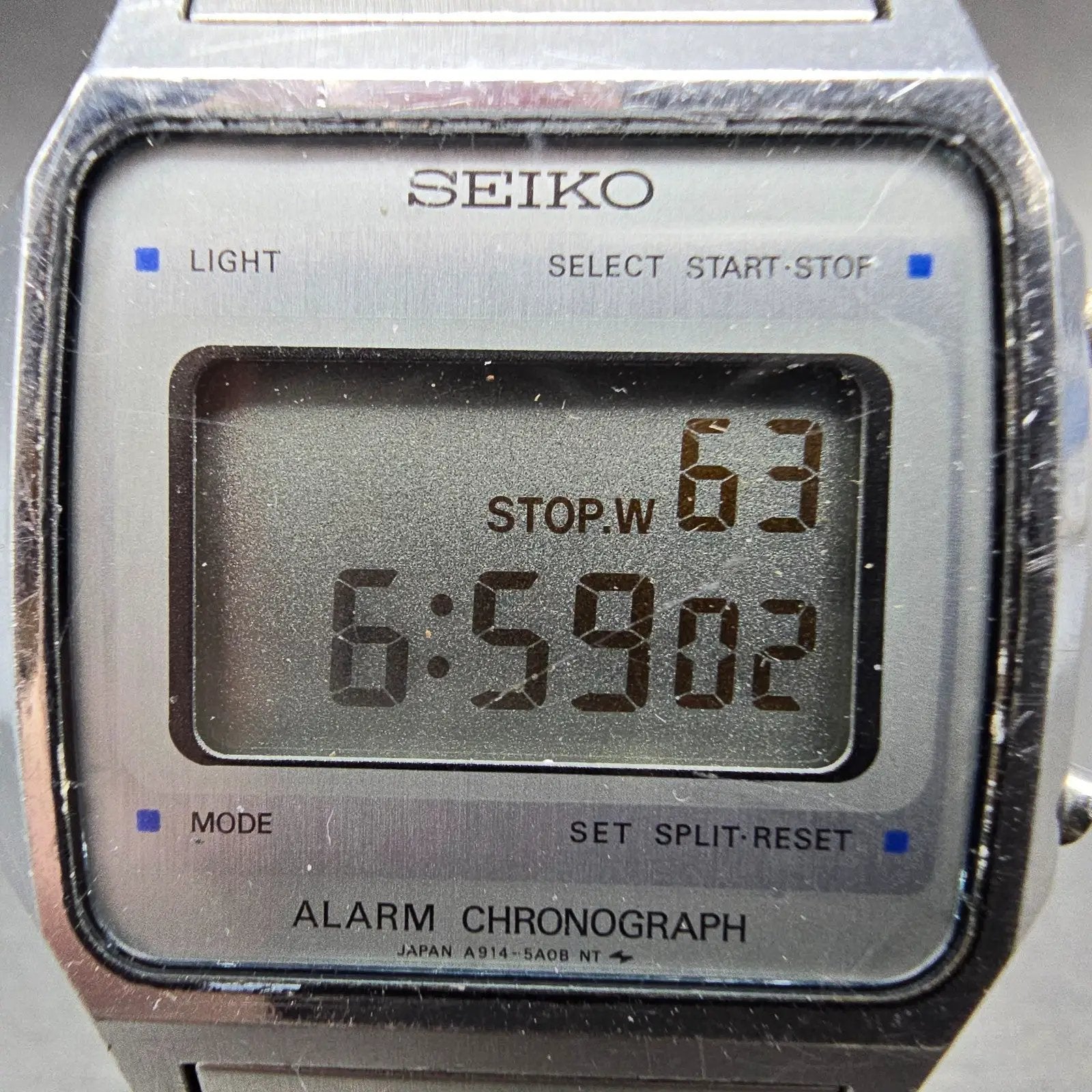 Seiko Digital Watch Men 34mm LCD Silver Alarm Chrono A914-5A09 New battery ABC1