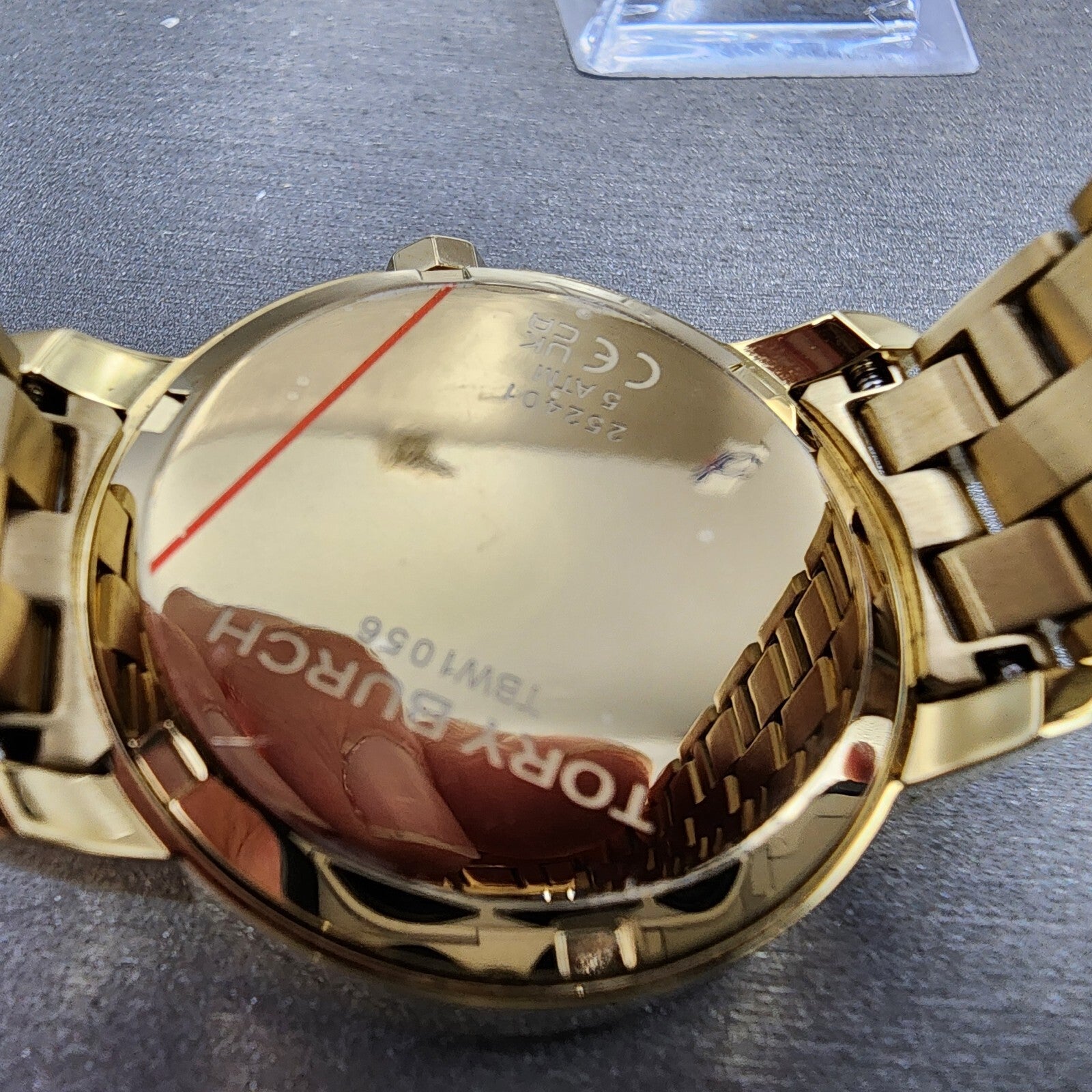 Tory Burch The Tory Watch Women 34mm Red Dial Gold Tone Round TBW105610