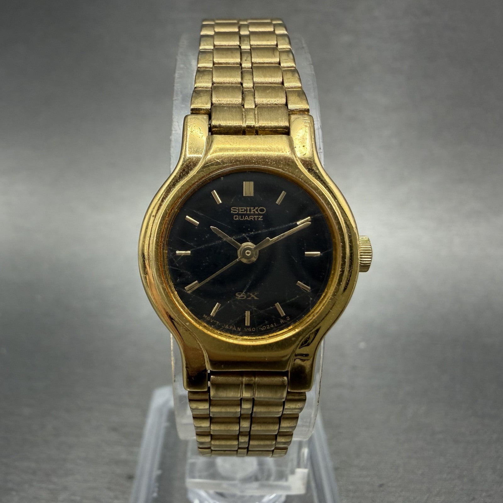 Seiko SX Watch Women 19mm Black Dial Gold Tone Round V4010091 New Battery0