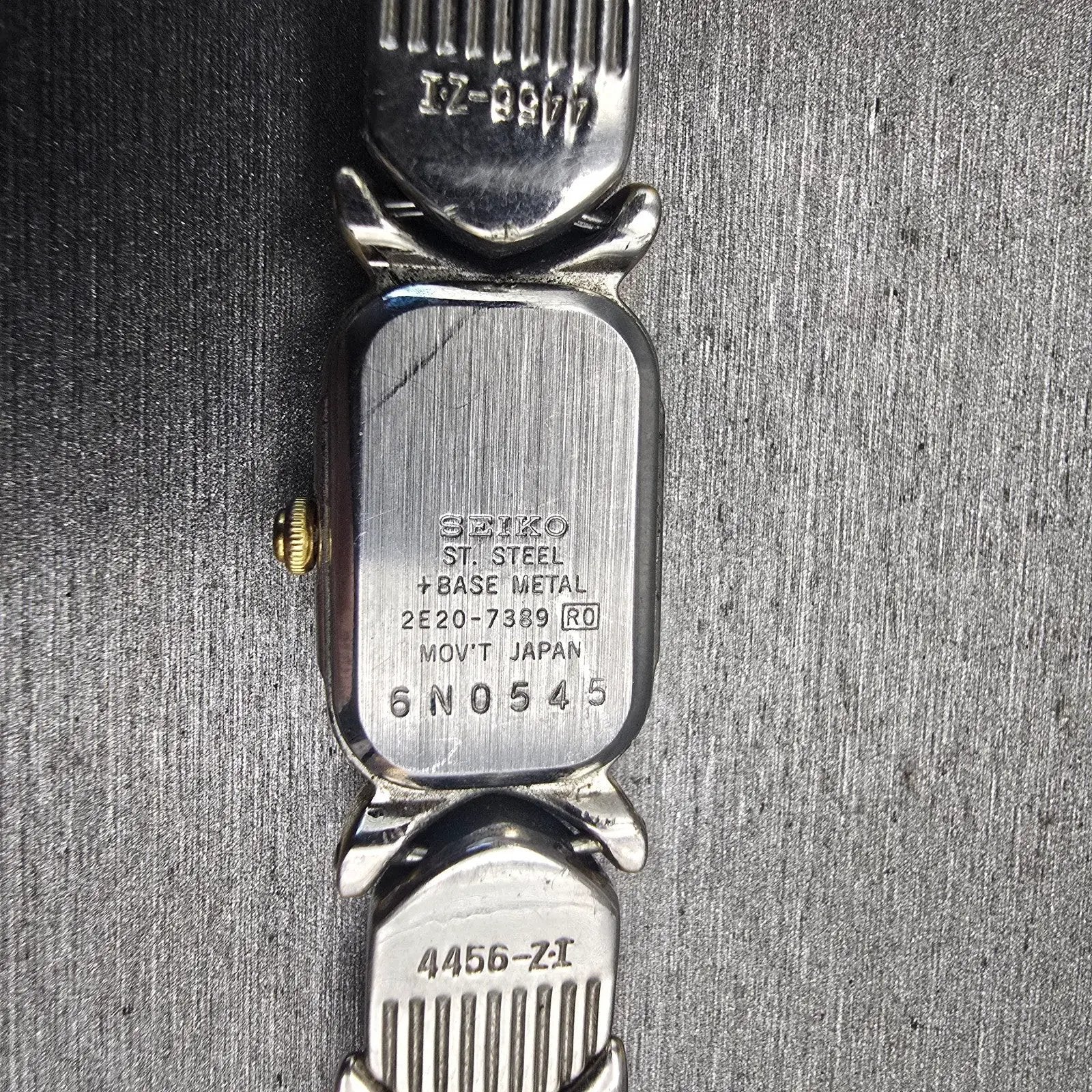 Seiko Watch Women 14mm White Dial Two Tone Rectangle 2E20-7389 New Battery VTG10