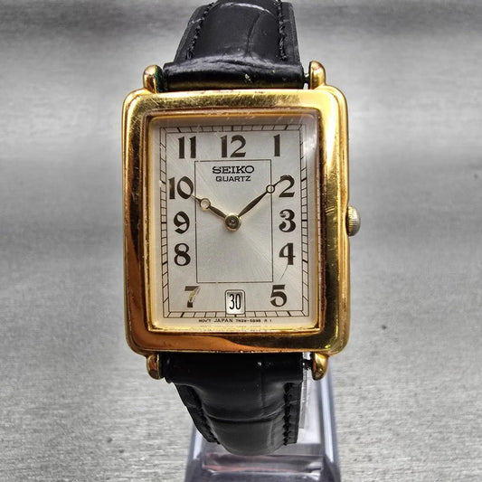 Seiko Tank Watch Men 26mm Silver Dial Gold Tone Date Rectangle 7N29-5B99 New Bat0